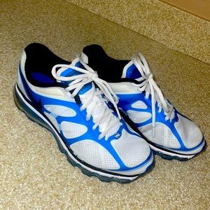 NIKE TENNIS SHOES. Size: 7Youth Blue&White. Gently used a few times.No worn sole